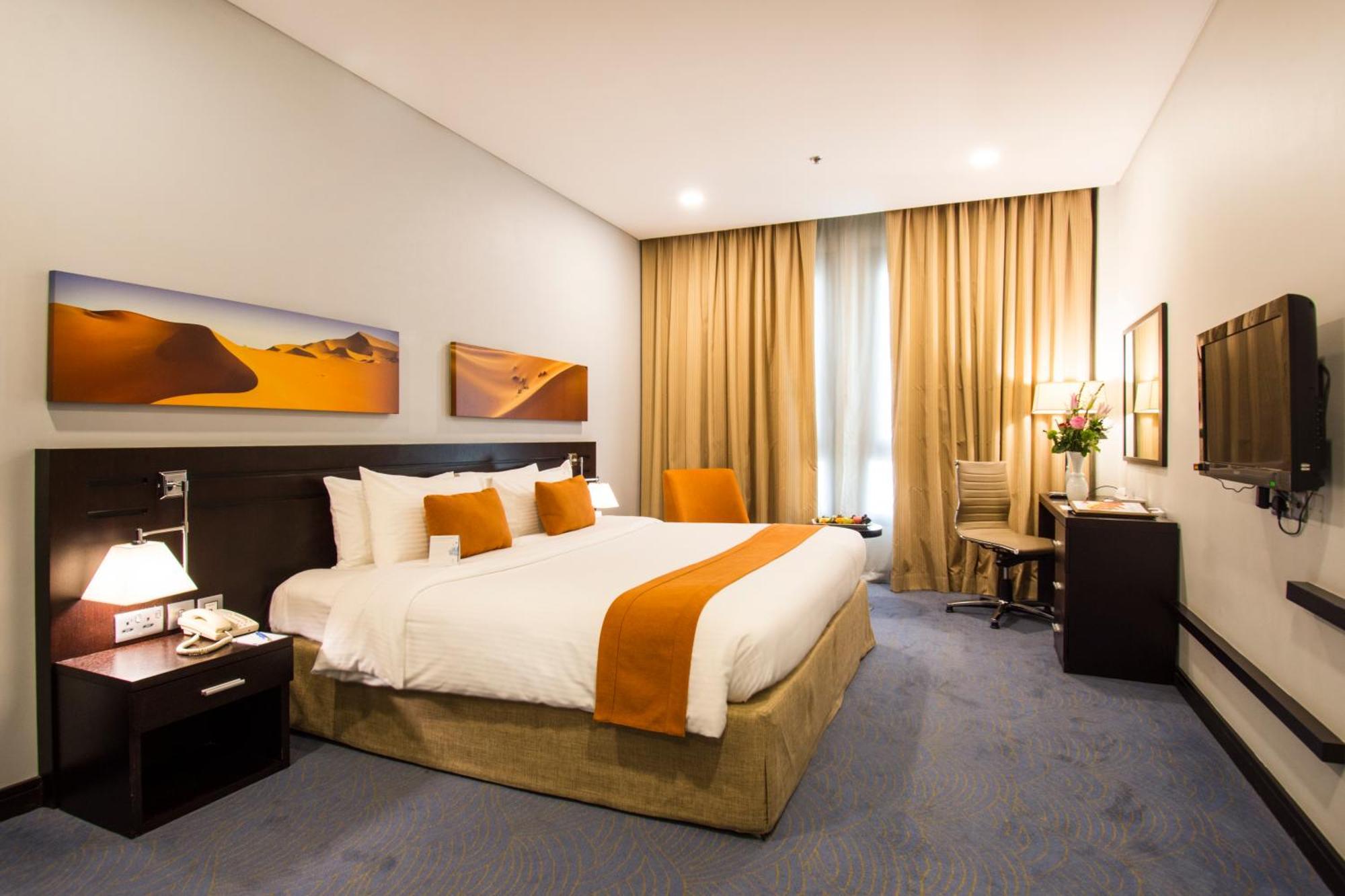 City Seasons Hotel & Suites Muskat Rom bilde