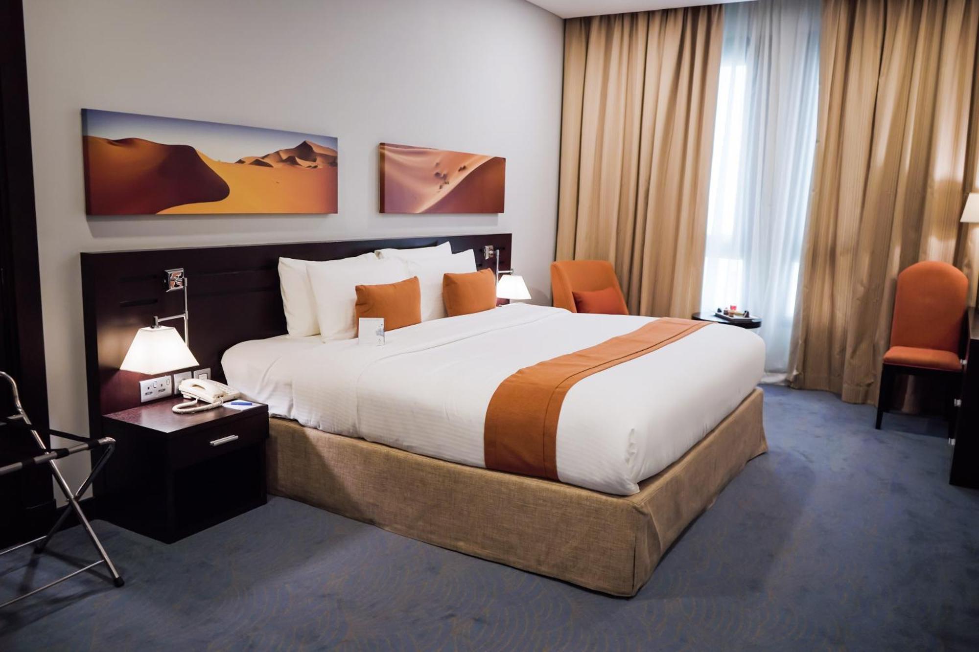 City Seasons Hotel & Suites Muskat Rom bilde