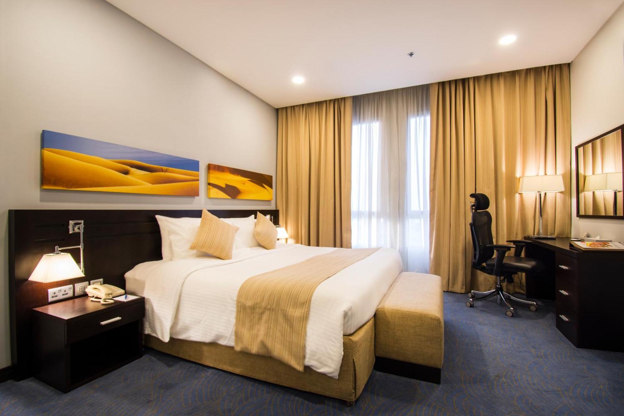 City Seasons Hotel & Suites Muskat Rom bilde