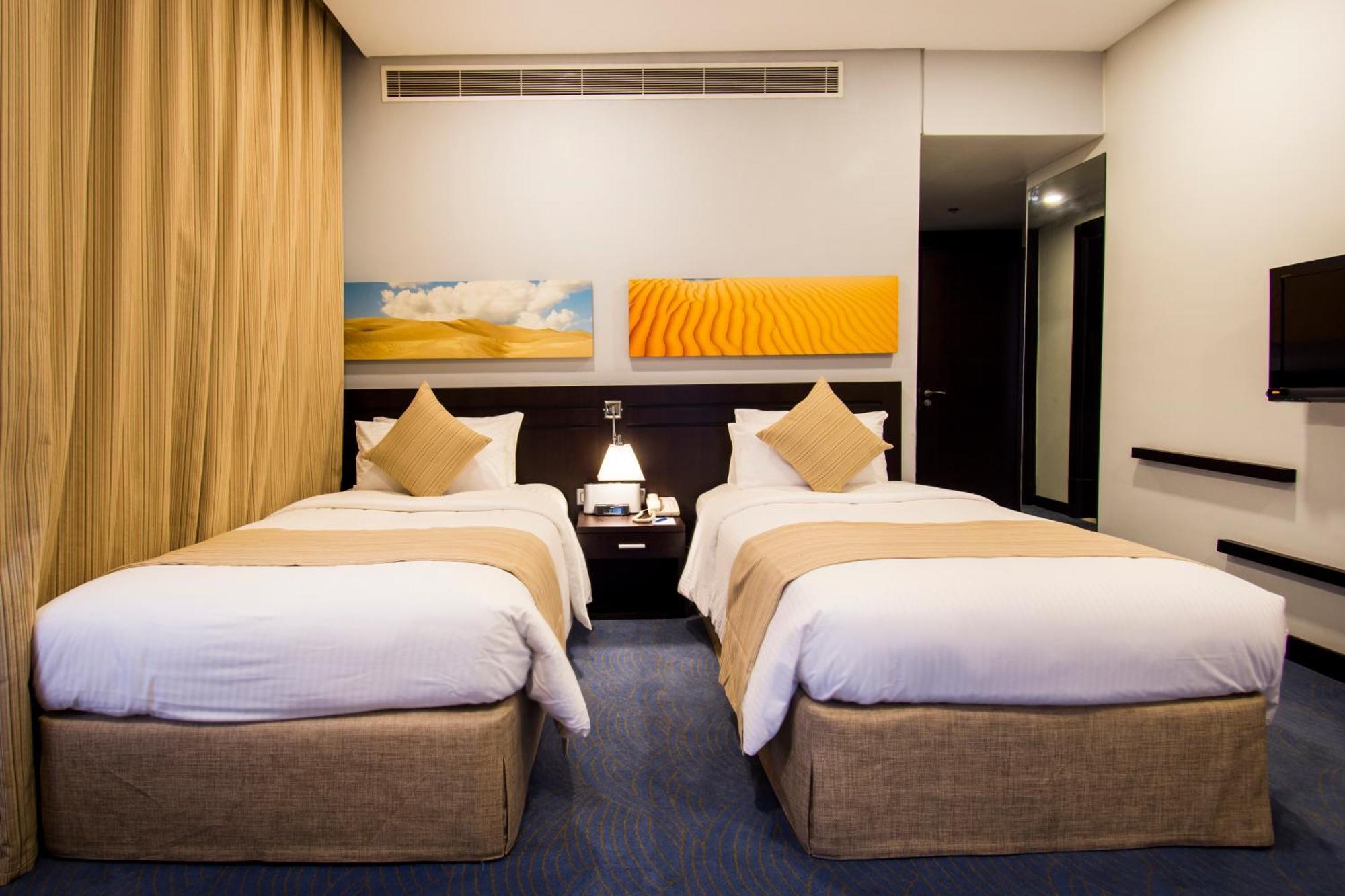 City Seasons Hotel & Suites Muskat Rom bilde