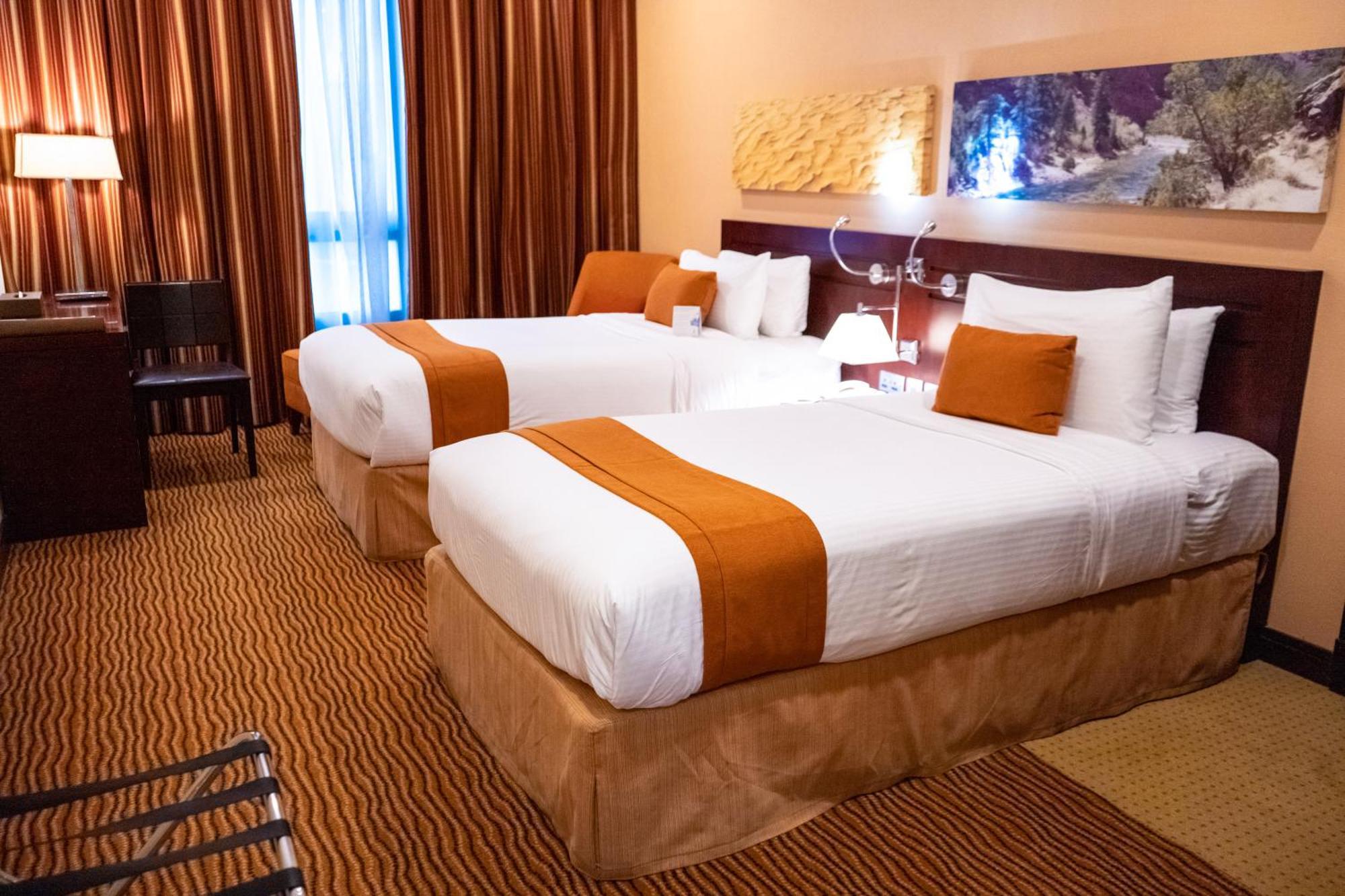 City Seasons Hotel & Suites Muskat Rom bilde