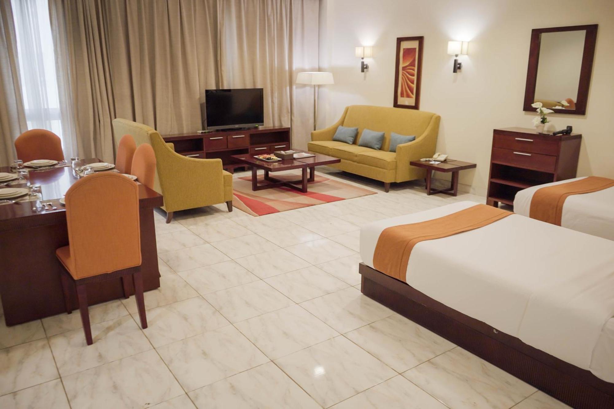 City Seasons Hotel & Suites Muskat Rom bilde